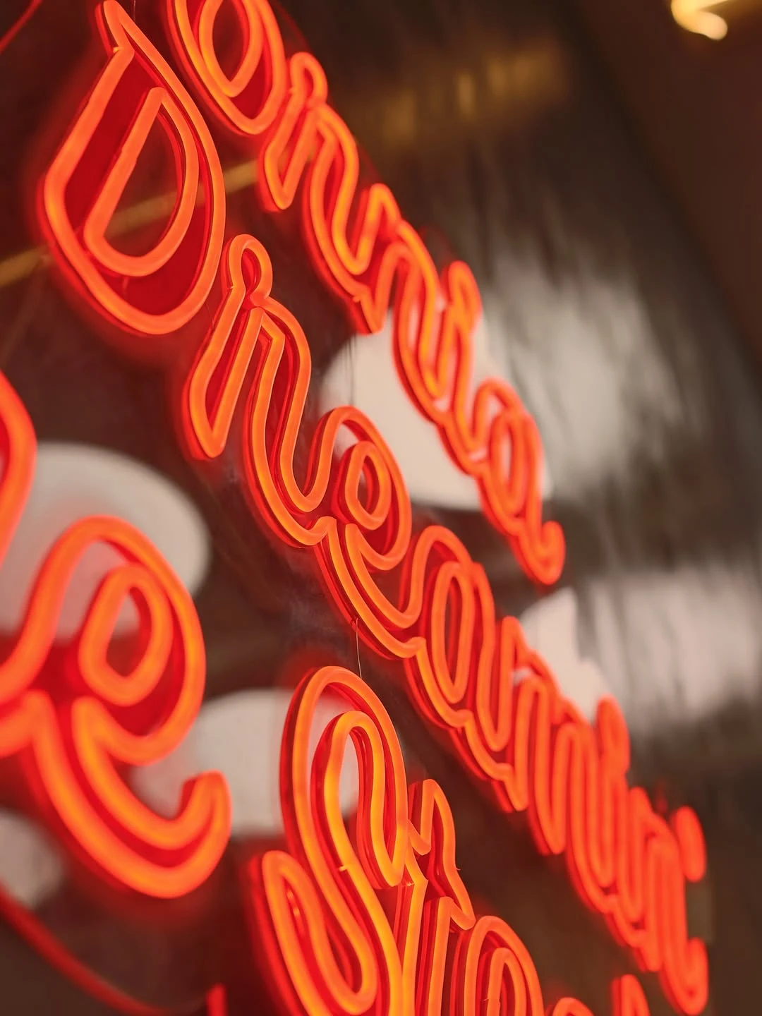 Close-up of the restaurant’s orange California Dreamin’ neon sign